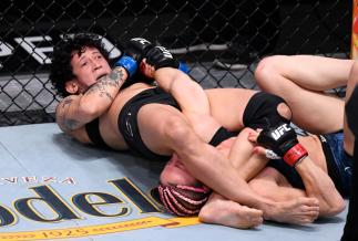 Virna Jandiroba of Brazil secures an arm bar submission against Felice Herrig in their strawweight bout during the UFC 252 event at UFC APEX on August 15, 2020 in Las Vegas, Nevada. (Photo by Chris Unger/Zuffa LLC)
