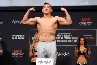 Da-un Jung of South Korea poses on the scale during the UFC fight night weigh-in at Sajik Arena on December 20, 2019 in Busan, South Korea. (Photo by Jeff Bottari/Zuffa LLC via Getty Images)