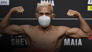 Deiveson Figueiredo of Brazil poses on the scale during the UFC 255 weigh-in at UFC APEX on November 20, 2020 in Las Vegas, Nevada. (Photo by Jeff Bottari/Zuffa LLC)
