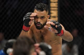 WASHINGTON, DC - DECEMBER 07: Rob Font battles Ricky Simon in their bantamweight bout during the UFC Fight Night event at Capital One Arena on December 07, 2019 in Washington, DC. (Photo by Jeff Bottari/Zuffa LLC)