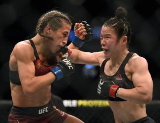 Weili Zhang punches Joanna Jedrzejczyk to a split decision win at T-Mobile Arena on March 07, 2020 in Las Vegas, Nevada. (Photo by Harry How/Getty Images)