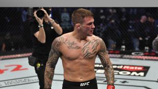 Dustin Poirier reacts after his knockout victory over Conor McGregor of Ireland in a lightweight fight during the UFC 257 event inside Etihad Arena on UFC Fight Island on January 23, 2021 in Abu Dhabi, United Arab Emirates. (Photo by Jeff Bottari/Zuffa LLC)