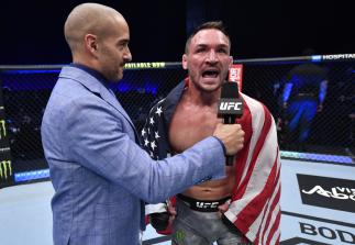 Michael Chandler reacts after his knockout victory over Dan Hooker of New Zealand in a lightweight fight during the UFC 257 event inside Etihad Arena on UFC Fight Island on January 23, 2021 in Abu Dhabi, United Arab Emirates. (Photo by Jeff Bottari/Zuffa LLC)