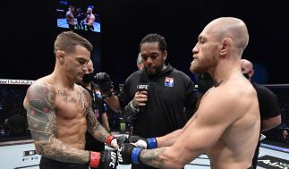 Opponents Dustin Poirier and Conor McGregor of Ireland face off prior to their lightweight fight during the UFC 257 event inside Etihad Arena on UFC Fight Island on January 23, 2021 in Abu Dhabi, United Arab Emirates. (Photo by Jeff Bottari/Zuffa LLC)