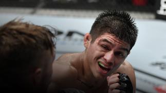 John Castaneda punches Nathaniel Wood of England in their bantamweight fight during the UFC Fight Night event inside Flash Forum on UFC Fight Island on July 26, 2020 in Yas Island, Abu Dhabi, United Arab Emirates. (Photo by Jeff Bottari/Zuffa LLC)
