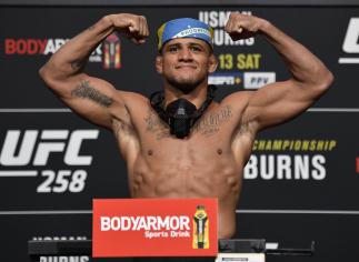 Gilbert Burns of Brazil poses on the scale during the UFC weigh-in at UFC APEX on February 12, 2021 in Las Vegas, Nevada. (Photo by Jeff Bottari/Zuffa LLC)