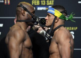 Opponents Kamaru Usman of Nigeria and Gilbert Burns of Brazil face off during the UFC weigh-in at UFC APEX on February 12, 2021 in Las Vegas, Nevada. (Photo by Jeff Bottari/Zuffa LLC)