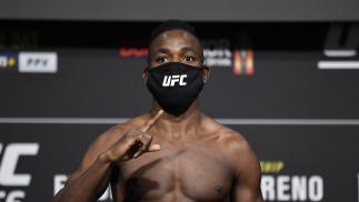 Manel Kape poses on the scale during the UFC 256 weigh-in at UFC APEX on December 11, 2020 in Las Vegas, Nevada. (Photo by Jeff Bottari/Zuffa LLC)