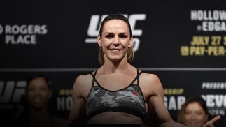 Alexis Davis of Canada poses on the scale during the UFC 240 weigh-in at Rogers Place on July 26, 2019 in Edmonton, Alberta, Canada. (Photo by Jeff Bottari/Zuffa LLC