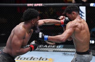 Kennedy Nzechukwu of Nigeria punches Carlos Ulberg of New Zealand in their light heavyweight fight during the UFC 259 event at UFC APEX on March 06, 2021 in Las Vegas, Nevada. (Photo by Jeff Bottari/Zuffa)