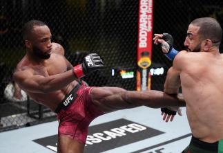 Leon Edwards of Jamaica kicks Bulal Muhammad in a welterweight fight during the UFC Fight Night event at UFC APEX on March 13, 2021 in Las Vegas, Nevada. (Photo by Jeff Bottari/Zuffa LLC)