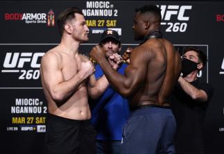 Stipe Miocic and Francis Ngannou of Cameroon face off during the UFC 260 weigh-in at UFC APEX on March 26, 2021 in Las Vegas, Nevada. (Photo by Jeff Bottari/Zuffa LLC)