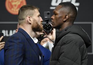 Opponents Jan Blachowicz of Poland and Israel Adesanya of Nigeria face off during the UFC 259 press conference at UFC APEX on March 04, 2021 in Las Vegas, Nevada. (Photo by Jeff Bottari/Zuffa LLC)