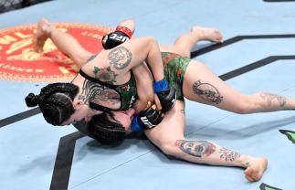 Montserrat Conejo of Mexico grapples Cheyanne Buys in their strawweight fight during the UFC Fight Night event at UFC APEX on March 20, 2021 in Las Vegas, Nevada. (Photo by Chris Unger/Zuffa LLC)