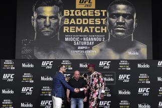Stipe Miocic and Francis Ngannou of Cameroon face off during the UFC 260 press conference at UFC APEX on March 25, 2021 in Las Vegas, Nevada. (Photo by Jeff Bottari/Zuffa LLC)