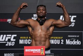 Francis Ngannou of Cameroon poses on the scale during the UFC 260 weigh-in at UFC APEX on March 26, 2021 in Las Vegas, Nevada. (Photo by Jeff Bottari/Zuffa LLC)