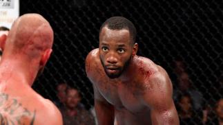Leon Edwards of Jamaica taunts Donald Cerrone in their welterweight bout during the UFC Fight Night event at the Singapore Indoor Stadium on June 23, 2018 in Singapore. (Photo by Jeff Bottari/Zuffa LLC)