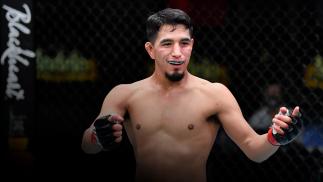 Adrian Yanez reacts after his knockout victory over Gustavo Lopez in their bantamweight fight during the UFC Fight Night event at UFC APEX on March 20, 2021 in Las Vegas, Nevada. (Photo by Chris Unger/Zuffa LLC)