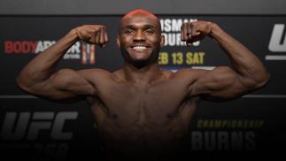 Kamaru Usman of Nigeria poses on the scale during the UFC weigh-in at UFC APEX on February 12, 2021 in Las Vegas, Nevada. (Photo by Jeff Bottari/Zuffa LLC)