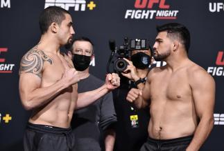 Robert Whittaker of Australia and Kelvin Gastelum face off during the UFC weigh-in at UFC APEX on April 16, 2021 in Las Vegas, Nevada. (Photo by Chris Unger/Zuffa LLC)
