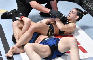 Mackenzie Dern secures an arm bar submission against Nina Nunes in a strawweight fight during the UFC Fight Night event at UFC APEX on April 10, 2021 in Las Vegas, Nevada. (Photo by Chris Unger/Zuffa LLC)