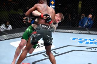 Marvin Vettori of Italy takes down Kevin Holland in a middleweight fight during the UFC Fight Night event at UFC APEX on April 10, 2021 in Las Vegas, Nevada. (Photo by Chris Unger/Zuffa LLC)