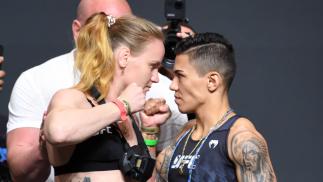 Valentina Shevchenko of Kyrgyzstan and Jessica Andrade of Brazil face off during the ceremonial UFC 261 weigh-in at VyStar Veterans Memorial Arena on April 23, 2021 in Jacksonville, Florida. (Photo by Josh Hedges/Zuffa LLC)