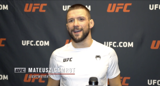 Mateusz Gamrot reacts with UFC.com after his second-round TKO over UFC lightweight Scott Holtzman at UFC Fight Night: Vettori vs Holland on April 10, 2021.