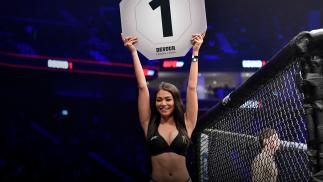 UFC Octagon Girl Red Dela Cruz introduces a round during the UFC 257 event inside Etihad Arena on UFC Fight Island on January 23, 2021 in Abu Dhabi, United Arab Emirates. (Photo by Jeff Bottari/Zuffa LLC)