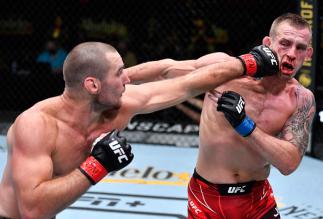 Sean Strickland punches Krzysztof Jotko of Poland in a middleweight bout during the UFC Fight Night event at UFC APEX on May 01, 2021 in Las Vegas, Nevada. (Photo by Jeff Bottari/Zuffa LLC)