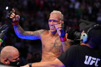 Charles Oliveira of Brazil celebrates after defeating Michael Chandler in their UFC lightweight championship bout at Toyota Center on May 15, 2021 in Houston, Texas. (Photo by Josh Hedges/Zuffa LLC)