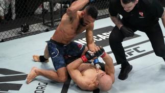 Rob Font punches Marlon Moraes of Brazil in a bantamweight fight during the UFC Fight Night event at UFC APEX on December 19, 2020 in Las Vegas, Nevada. (Photo by Cooper Neill/Zuffa LLC)