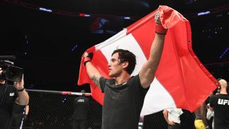 Claudio Puelles of Peru celebrates his victory over Marcos Mariano of Brazil in their lightweight bout during the UFC Fight Night event on September 21, 2019 in Mexico City, Mexico. (Photo by Josh Hedges/Zuffa LLC)