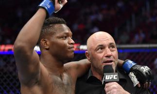 Terrance McKinney is interviewed by Joe Rogan after knocking out Matt Frevola in their lightweight fight during the UFC 263 event at Gila River Arena on June 12, 2021 in Glendale, Arizona. (Photo by Jeff Bottari/Zuffa LLC)