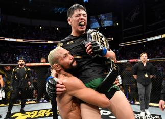 Brandon Moreno of Mexico reacts after submitting Deiveson Figueiredo of Brazil to win the UFC flyweight championship fight during the UFC 263 event at Gila River Arena on June 12, 2021 in Glendale, Arizona. (Photo by Jeff Bottari/Zuffa LLC)