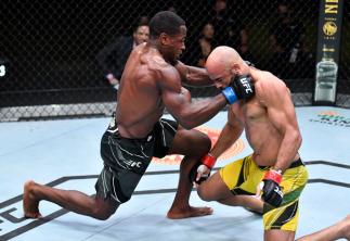 Jeremiah Wells punches Warlley Alves of Brazil in a welterweight fight during the UFC Fight Night event at UFC APEX on June 26, 2021 in Las Vegas, Nevada. (Photo by Chris Unger/Zuffa LLC)