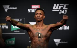 Israel Adesanya of New Zealand poses on stage during the UFC 243 weigh-in at Marvel Stadium on October 05, 2019 in Melbourne, Australia. (Photo by Jeff Bottari/Zuffa LLC)