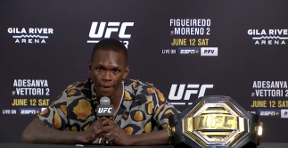 Israel Adesanya talks with the media after defeating Marvin Vettori at UFC 263.