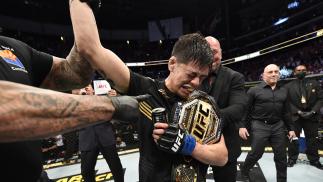Brandon Moreno of Mexico reacts after submitting Deiveson Figueiredo of Brazil to win the UFC flyweight championship fight during the UFC 263 event at Gila River Arena on June 12, 2021 in Glendale, Arizona. (Photo by Jeff Bottari/Zuffa LLC)