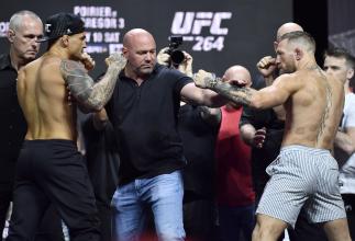 Dustin Poirier and Conor McGregor of Ireland face off during the UFC 264 ceremonial weigh-in at T-Mobile Arena on July 09, 2021 in Las Vegas, Nevada. (Photo by Jeff Bottari/Zuffa LLC)