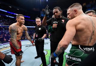 Opponents Dustin Poirier and Conor McGregor of Ireland face off prior to their welterweight fight during the UFC 264 event at T-Mobile Arena on July 10, 2021 in Las Vegas, Nevada. (Photo by Jeff Bottari/Zuffa LLC)