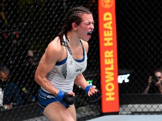 Miesha Tate reacts after her victory over Marion Reneau in their bantamweight bout during the UFC Fight Night event at UFC APEX on July 17, 2021 in Las Vegas, Nevada. (Photo by Jeff Bottari/Zuffa LLC)