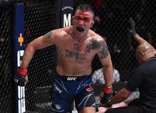 Darren Elkins reacts after his TKO victory over Darrick Minner in their featherweight fight during the UFC Fight Night event at UFC APEX on July 24 2021 in Las Vegas Nevada. (Photo by Jeff Bottari/Zuffa LLC)