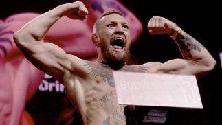 Conor McGregor poses for a photo during the UFC 264 ceremonial weigh-ins (Zuffa LLC).