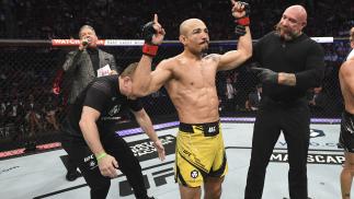 Jose Aldo of Brazil reacts after defeating Pedro Munhoz of Brazil in their bantamweight bout during the UFC 265 event at Toyota Center on August 07 2021 in Houston Texas. (Photo by Josh Hedges/Zuffa LLC)