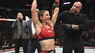 Tecia Torres reacts after defeating Angela Hill in their women's strawweight bout during the UFC 265 event at Toyota Center on August 07 2021 in Houston Texas. (Photo by Josh Hedges/Zuffa LLC)