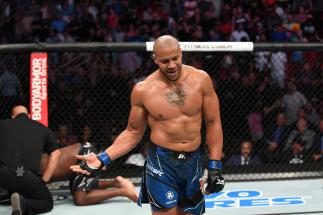 Ciryl Gane of France reacts after defeating Derrick Lewis in their interim heavyweight title bout during the UFC 265 event at Toyota Center on August 07, 2021 in Houston, Texas. (Photo by Josh Hedges/Zuffa LLC)