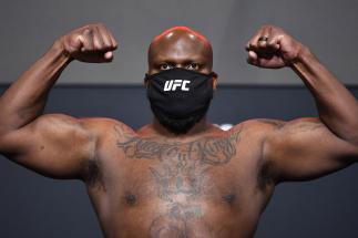 Derrick Lewis poses on the scale during the UFC weigh-in at UFC APEX on February 19, 2021 in Las Vegas, Nevada. (Photo by Chris Unger/Zuffa LLC)
