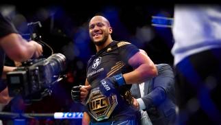 Ciryl Gane of France reacts after defeating Derrick Lewis in their interim heavyweight title bout during the UFC 265 event at Toyota Center on August 07, 2021 in Houston, Texas. (Photo by Cooper Neill/Zuffa LLC)