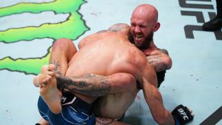 Brian Kelleher attempts to submit Domingo Pilarte in their bantamweight matchup at UFC Fight Night: Cannonier vs Gastelum on August 21 2021 in Las Vegas Nevada. (Photo by Chris Unger/Zuffa LLC)